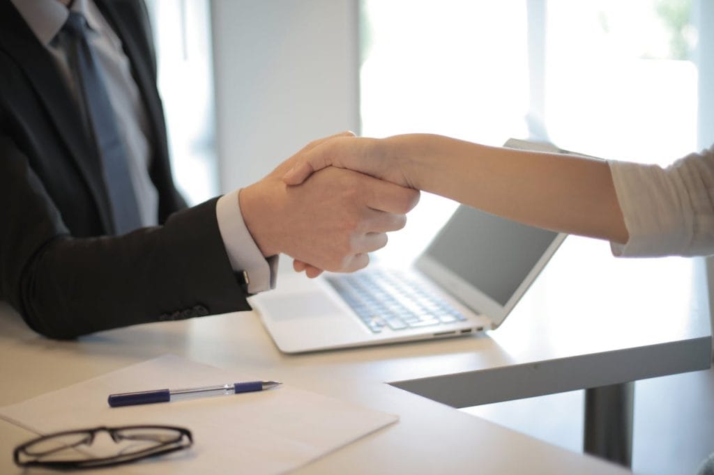 shake hands clients first