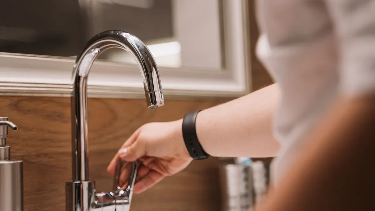 A person prepares to use the faucet