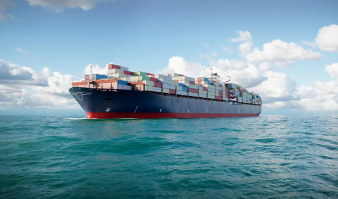 The cargo ship is moving forward on the sea